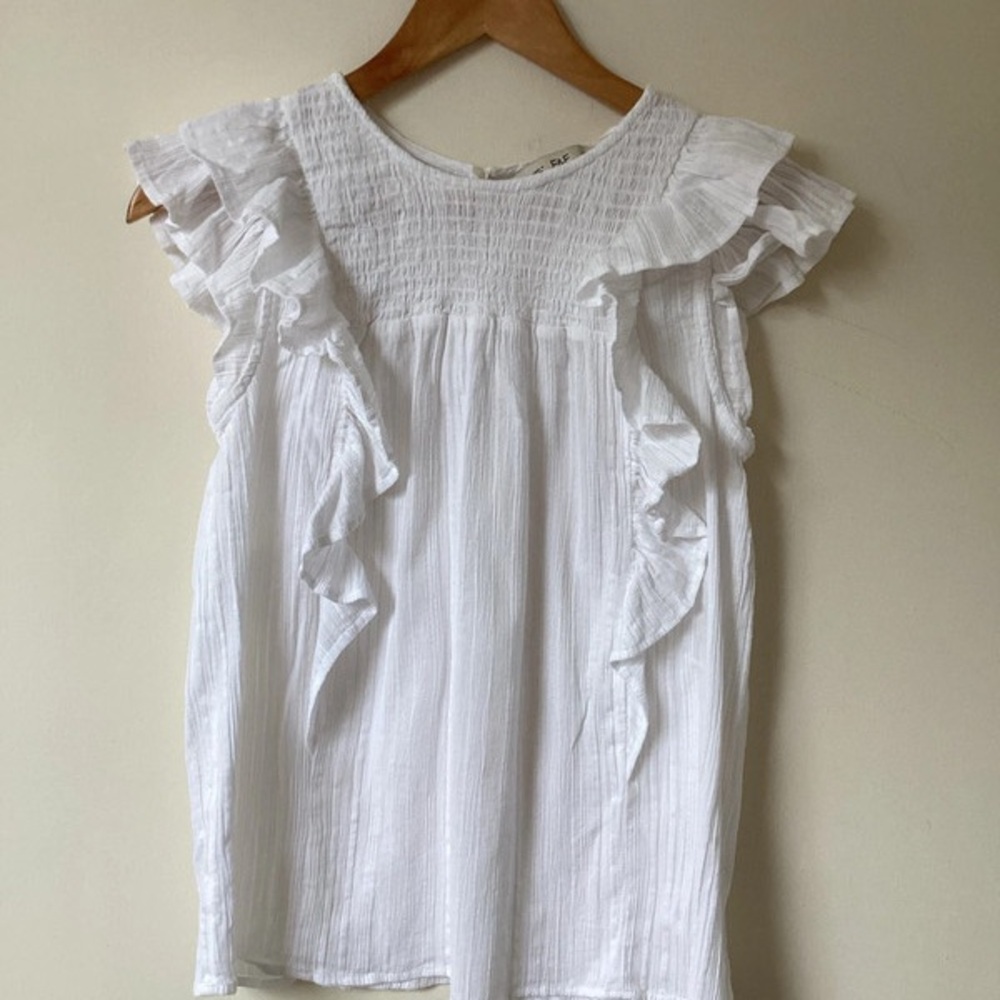 White Ruffled Sleeveless Blouse